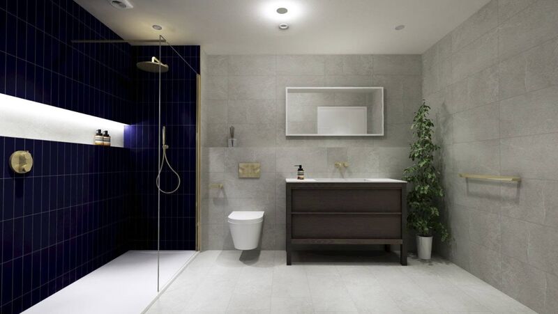Bathroom with navy tiled walk-in shower, brass fittings and a dark wood vanity