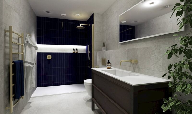 Navy tiled walk-in shower beside a dark wood vanity with brass taps